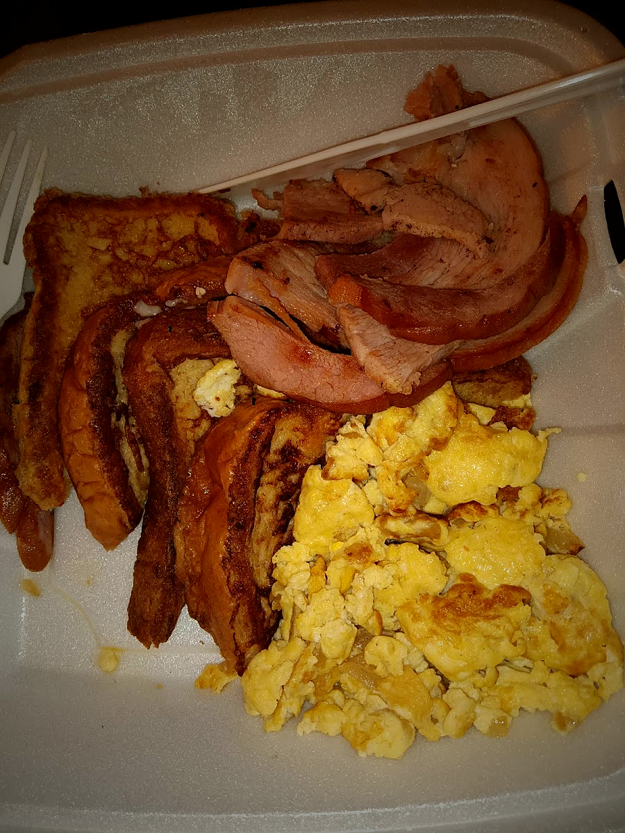 Breakfast at Geneva's: bacon, french toast and scrambled eggs.