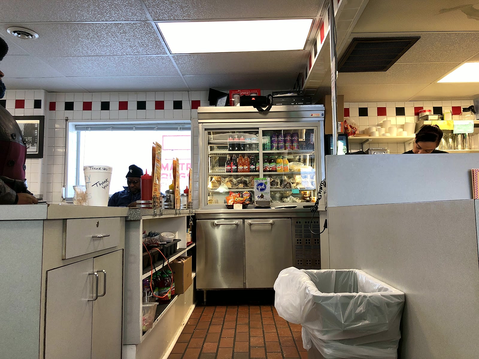 The counter and stools inside Geneva's Burgers.